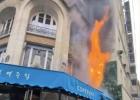 Main image for Paris Police Battle Fire During Mass Protests.