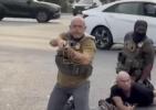 Main image for ICE Agent Drops Gun, Points at Bystanders in Maryland Arrest. 