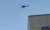 Main image for Black Hawk Helicopters Fly Over Portland ICE Facility. 