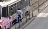 Main image for Man Falls Under Moving Tram &mdash; Walks Away Unharmed.