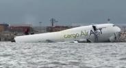 Main image for UPDATE: Two Dead as Cargo Plane Skids Off Runway in Hong Kong.