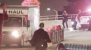 Main image for Tense Scene in Alameda as Police Open Fire on Approaching Van. 