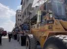 Main image for Khan Yunis Crews Work To Clear Rubble Amid Tension. 
