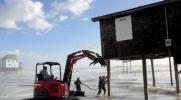 Main image for Race Against the Tide: Buxton Locals Struggle to Save Vanishing Homes.
