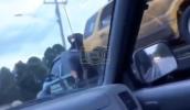 Main image for Man Leaps Onto Moving Tow Truck to Rescue Towed SUV.