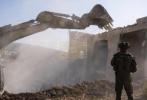 Main image for IDF Demolishes Home of Attacker Behind Deadly West Bank Shooting.