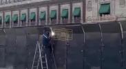Main image for Mexico's President Orders Barrier Wall Around National Palace Ahead tp Protect from Protest.