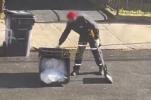Main image for New Jersey Sanitation Worker Startled by Rat in Trash Can.