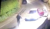 Main image for Masked Thugs in Hazmat Suits Chase Victim with Machetes.