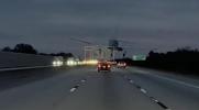 Main image for MOMENT: A Dashcam Captures Plane Dropping Onto a Running Car.