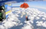 Main image for A Skydiver's Parachute Wrapped Around an Airplane's Wings.