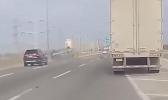 Main image for Dashcam Shows Near-Miss Between SUV and Semi on I-88.
