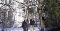 Main image for FBI Searches Snowy Providence for Clues After Bwon University Campus Mass Shooting.