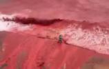 Main image for Natural Phenomenon Turns Iranian Beach Deep Red After Rain.