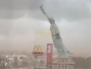 Main image for Brazil Storm Brings Down 24-Meter Statue of Liberty Replica.