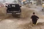 Main image for Holiday Stunt Turns Risky as Man Rides Floodwaters in Hesperia.