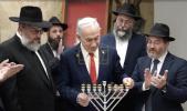 Main image for Netanyahu Lights Final Hanukkah Candle, Honors Chabad Resilience.
