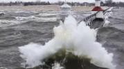 Main image for Frozen Lighthouse Engulfed by Monster Waves in Lake Michigan Storm.