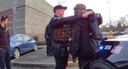 Main image for Police Buy Warm Clothes for Freezing Homeless Shoplifting Suspect.