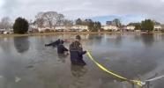 Main image for Police Rescue Boy After Ice Breaks in Frozen Pond.