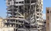 Main image for Gazans Warn of Imminent Tower Collapse in Central Gaza City.