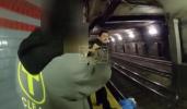 Main image for Body Cam Shows Officers Racing to Rescue Man From Subway Tracks.