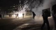 Main image for Federal Officers Deploy Flashbangs at Minneapolis Protest Scene.