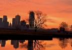Main image for CALM BEFORE THE STORM: Orange Sunrise Over Dallas Signals Incoming Winter Storm.