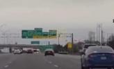 Main image for Dashcam Shows a Car Colliding With Overhead Sign.