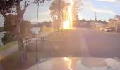 Main image for Lightning Strikes Just Feet From Car in Terrifying Dashcam Video.