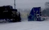 Main image for Train Smashes Into Stuck Semi During North Carolina Snowstorm.