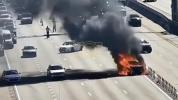Main image for Traffic Cameras Captured the Moment a Car Burst into Flames.