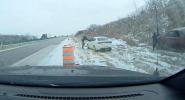 Main image for Nebraska Troopers Dodge Disaster as Car Slides Into Their Car.