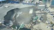 Main image for Roadway Vanishes in China After a Sudden Massive Sinkhole.