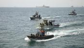 Main image for Iran&ndash;Russia Naval Forces Simulate Hijacked Vessel Rescue.
