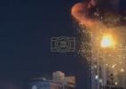 Main image for Iranian Drone Hits High-Rise in Bahrain, Four Injured.