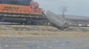 Main image for Train Rips Trailer From Truck in Violent Rail Collision.
