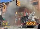 Main image for Dramatic Rescue as Firefighters Enter Window During Inferno.