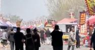Main image for Vehicle Charges Through China Market in Apparent Revenge Attack.