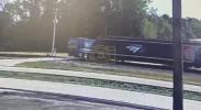 Main image for CCTV Captures Moment Amtrak Train Strikes Garbage Truck.