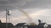 Main image for Iowa Rope Tornado Sparks Panic as Violent Storms Unleash 89 MPH Winds.