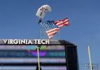 Main image for Skydiver Crashes Into Scoreboard At Virginia Tech Spring Game Stadium.