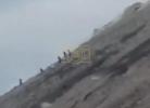 Main image for Deadly Close Call: Shocking Footage Shows Hikers Dodging Deadly Rockfall Inside Erupting Volcano Crater.