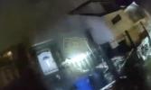 Main image for NYPD Bodycam Captures Officers Thrown by Explosion Before Daring Rescue of Children in Burning Queens Home.