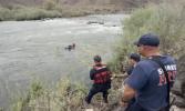 Main image for Rescue Swimmers Brave Dangerous Currents To Save Two Stranded On Rock In Truckee River Emergency.
