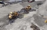 Main image for NYPD Crushes Over 5,700 Illegal Scooters as Bulldozers Destroy Confiscated Vehicles.