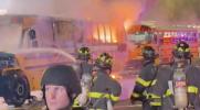 Main image for Knicks Victory Turns to Mayhem: Fans Destroy School Buses and Set One on Fire in Times Square Madness.