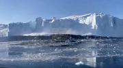 Main image for Stunning Video from Greenland: Huge Iceberg Collapses into Sea with Earth-Shaking Splash Caught on Camera/ 