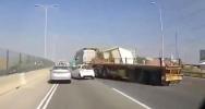 Main image for Terrifying Moment Caught on Video: Severe Wreck Involving White Car and Semi-Truck on Busy Israeli Highway.