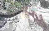Main image for Horrifying Bridge Collapse in India Sends Overloaded Truck Crashing into River.